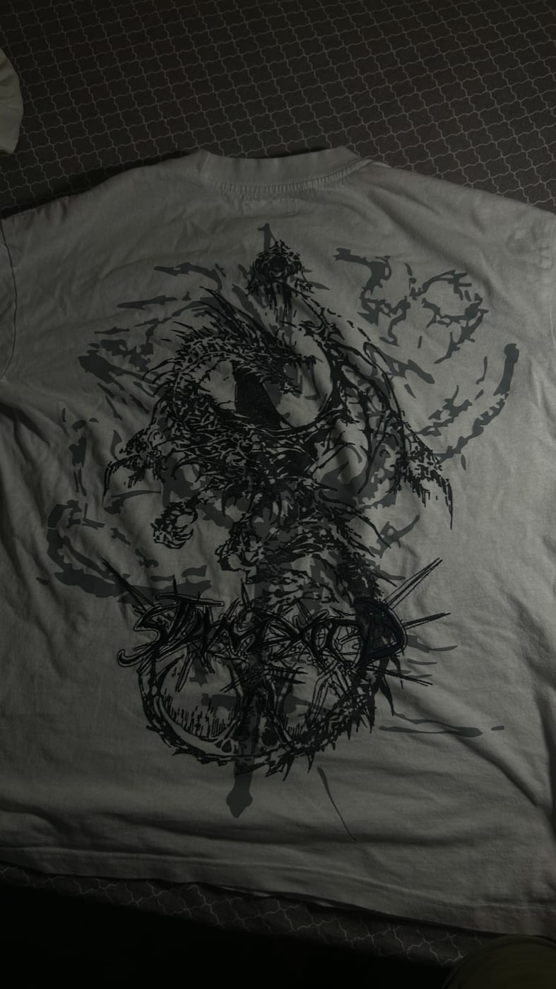 The back of the same tee: a large dragon print with the Standard logo beneath it